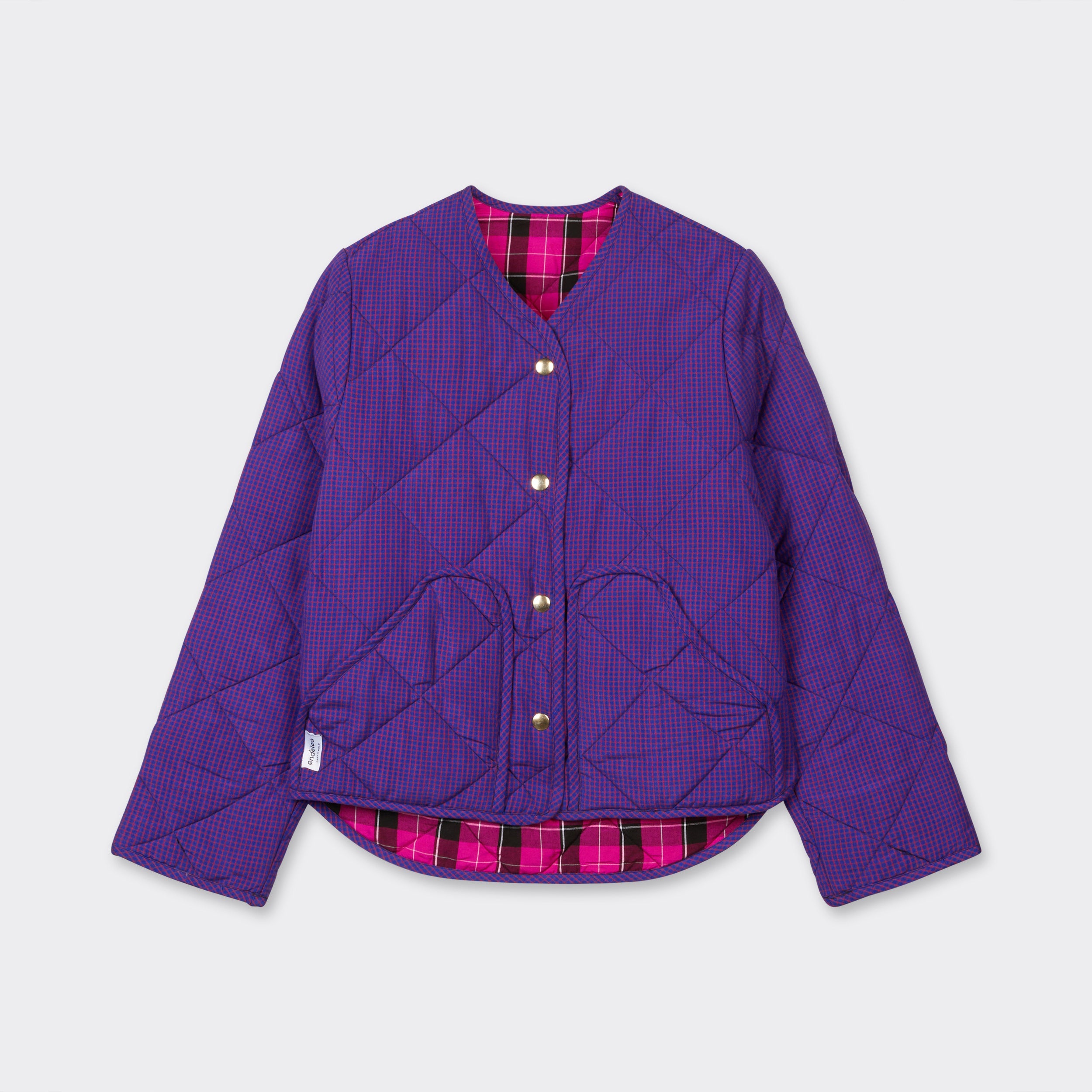 Reversible quilted jacket in pink checked Maasai fabric  on the purple side