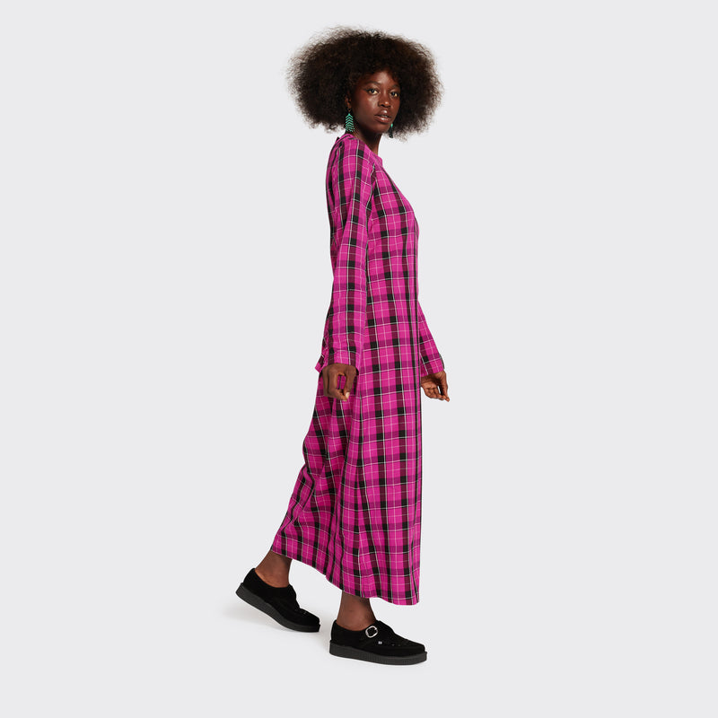 Long pink dress in Maasai fabric with black checks on model