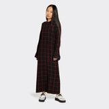 Long black dress in Maasai fabric with red checks on model