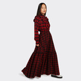 Black maxi skirt in Maasai fabric with red checks on model