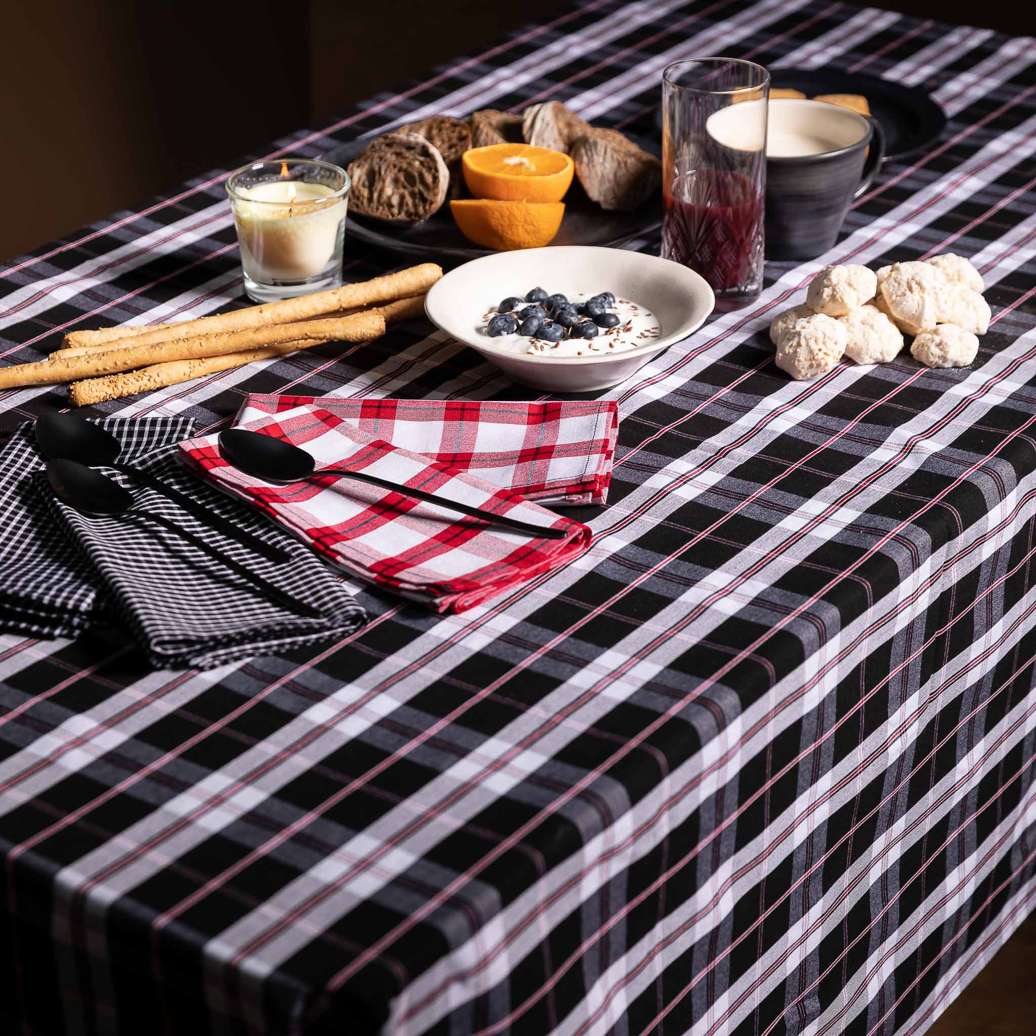 Table set with Maasai tablecloth checks and Maasai checks pair of napkins red&whites