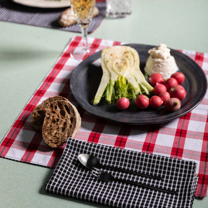Maasai checkered placemat on red&white side with a pair of matching Maasai checkered napkins