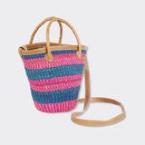 Still life: Mini Shopping Bag in Sisal Pink & Blue, the long should strap is visible.