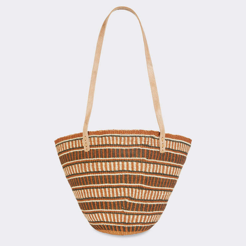 Still life: Shopping Bag in Sisal Brown with the color brown.