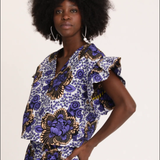 Video: Models Wear Ruffled Tops in Wax Lilac Peonies and African Dream.