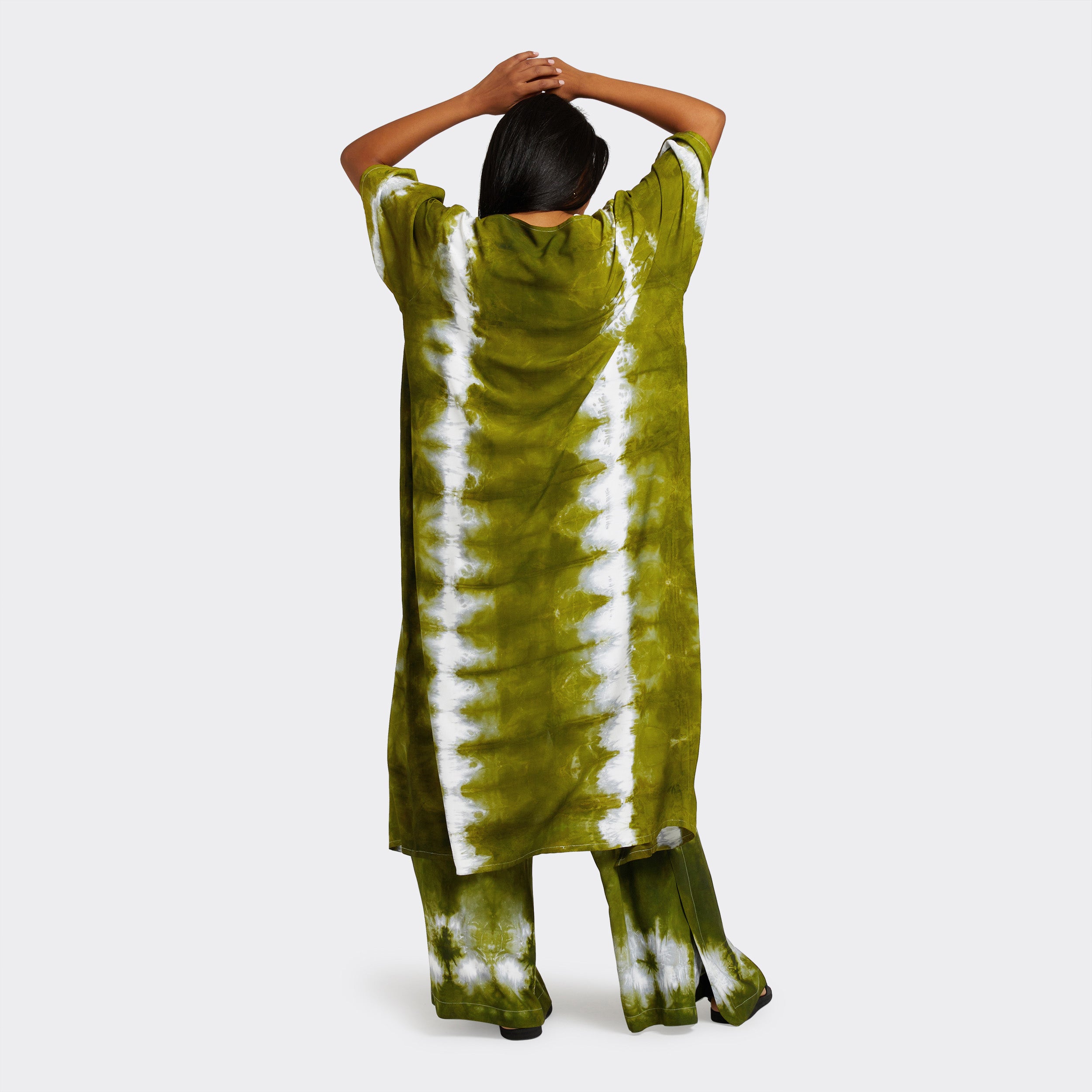 Model wears a Kimono in Tie Dye Intense Green with the Wrap Trousers in Tie Dye Intense Green.