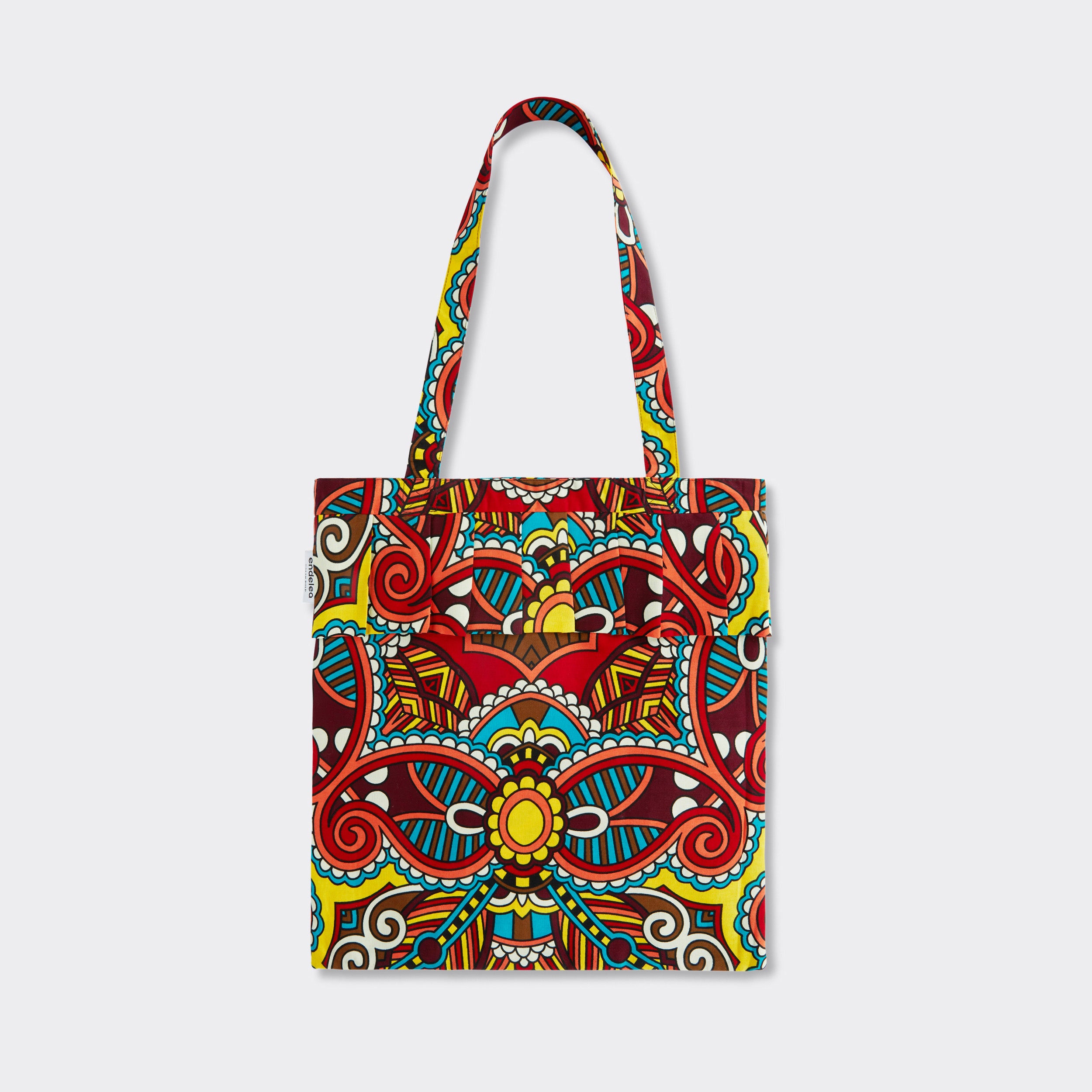 Still life: Tote Bag with Rouche in Wax African Dream with colors red, blue, yellow. 