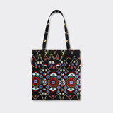 Still life: Tote Bag with Rouche in Wax Almasi Game with colors black and red.