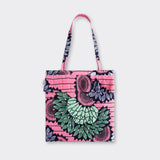 Still life: Tote Bag with Rouche in Wax Dreamcatcher with colors pink, blue and green. 