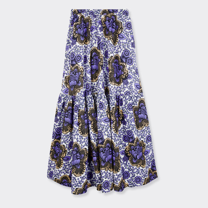 Still life : Flounced Maxi Skirt in Wax Lilac Peonies with the color lilac and white..