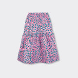 Still life: Flounced Maxi Skirt Baby in Wax Pretty Little Flowers with colors pink and blue.